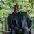 DRC's former president, Joseph Kabila, smiles as he sits on an outdoor patio at his home near Goma in eastern Congo