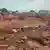 People search in flooded area following a downpour in Mokwa, Nigeria, Friday, May 30, 2025