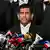 Chief prosecutor of Bangladesh's International Crimes Tribunal (ICT) Mohammad Tajul Islam (R) speaks during a press conference outside the ICT court in Dhaka on June 1, 2025