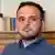 Close-up of Radio Free Europe/ Radio Liberty journalist Farid Mehralizada