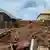 Damaged buildings in Mokwa after the town was hit by torrential rains