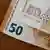 A Bulgarian 50-lev bill and a €50 bill
