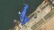 A stock image shows the ship covered in blue tarp on May 23, 2025 A stock image shows the ship covered in blue tarp on May 23, 2025
