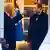 Trump e Musk frente a frente em uma sala, Trump aponta com seu dedo para frente