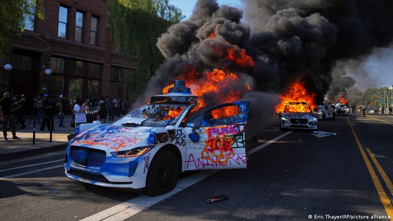 Waymo self-driving taxis were set on fire during protests on Sunday