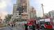 Bomberos y rescatistas delante de un edificio bombardeado en Teherán, luego de un ataque de Israel. (13.06.2025).