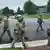 Police on the manhunt for a shooter who targeted two state lawmakers on June 14, 2025