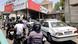 Motorists at a petrol station in Tehran Motorists at a petrol station in Tehran