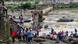People gather near the site of a bridge collapse at Indrayani river near Kundamala village in Pune, India People gather near the site of a bridge collapse at Indrayani river near Kundamala village in Pune, India
