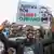 Demonstrators displaying posters with Kenyan blogger Albert Ojwang's face and the word "Justice for Albert Ojwang" on it.