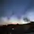 Smoke plumes billow following an overnight Israeli strike on Tehran