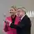 Kirsty Coventry accepts a symbolic key from Thomas Bach