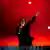 Ozzy Osbourne waves to the crowd at the 2022 Commonwealth Games.