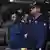 José Adolfo Macias Villamar, alías "Fito", al centro, cuando llegó a Guayaquil escoltado por militares, tras ser recapturado. (25.06.2025)