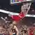 Basketballer Niels Giffey vom FC Bayern München hängt nach einem Dunking im Spiel gegen ratiopharm Ulm am Korb