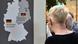 Ludzie patrzą na tablice pokazującą mapę Niemiec i jednoczący się wschód i zachód kraju Ludzie patrzą na tablice pokazującą mapę Niemiec i jednoczący się wschód i zachód kraju