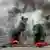 Makeshift barricades burn as people protest against Togo's longtime leader, Faure Gnassingbe, in Lome in June 2025