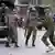 Kenyan policemen at the protest where Boniface Kariuk, not pictured, was shot