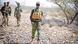 Ayub Abdirizak with armed fighters in Somalia