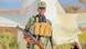 Yacqwub Siyadd in uniform and with an AK-47 in his hand