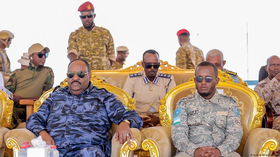 Ayub Abdirizak one row behind Puntland President Deni, who sits in a golden chair