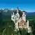 Neuschwanstein Castle towers over the edge of the Alps, Bavaria, Germany