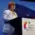 Tamar Kinturashvili in a light blue blazer, speaks at the Global Media Forum 2025.