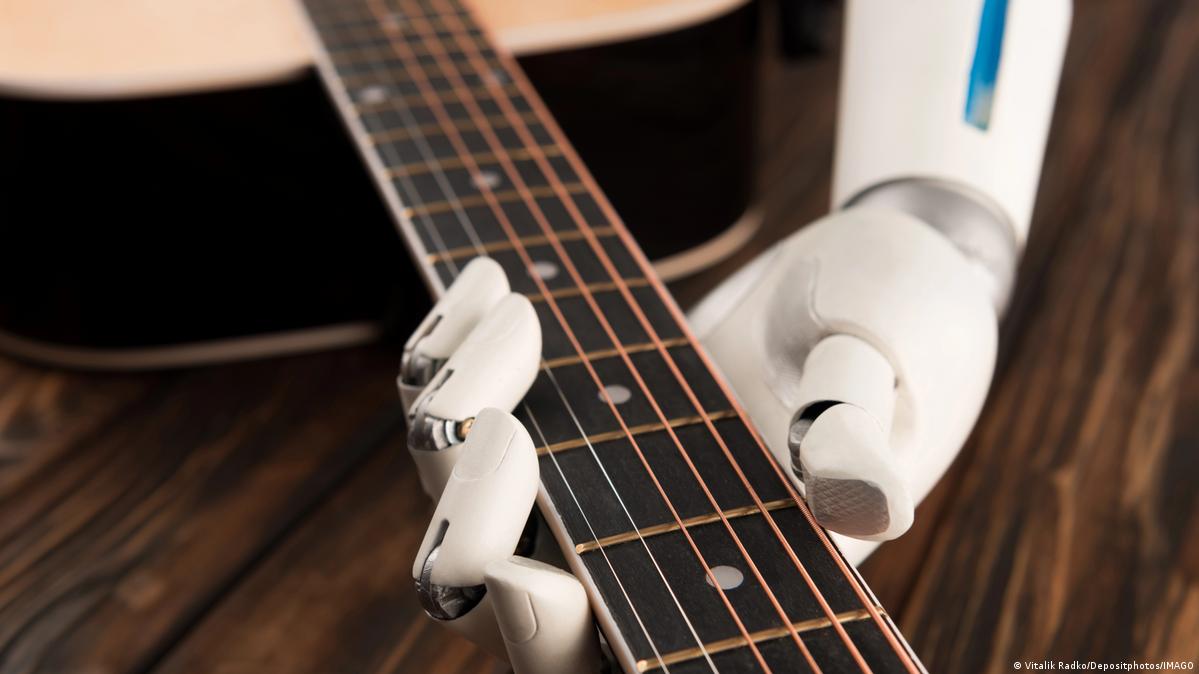 Cropped shot of robot playing the guitar