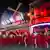 Moulin Rouge dancers perform underneath the new the sails of The Moulin Rouge Windmill as they celebrate it's return to use, in Paris on July 10, 2025