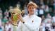 Jannik Sinner holds the trophy after winning the men's singles final match against Carlos Alcaraz of Spain at the Wimbledon Tennis Championships in London Jannik Sinner holds the trophy after winning the men's singles final match against Carlos Alcaraz of Spain at the Wimbledon Tennis Championships in London