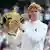 Jannik Sinner holds the trophy after winning the men's singles final match against Carlos Alcaraz of Spain at the Wimbledon Tennis Championships in London