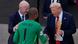 Gianni Infantino pats Chelsea goalkeeper on the back as he prepares to receive a golden glove trophy from Donald Trump while shaking hands Gianni Infantino pats Chelsea goalkeeper on the back as he prepares to receive a golden glove trophy from Donald Trump while shaking hands
