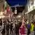 Festively dressed audience in front of the Festival Hall in Salzburg.