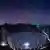 Foto tomada el 27 de junio de 2016 que muestra el telescopio esférico de 500 metros de apertura, o «FAST», por la noche en el condado de Pingtang, en la provincia de Guizhou, al suroeste de China.