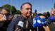 Brazil's former President Jair Bolsonaro speaks to the press outside the Secretariat of Penitentiary Administration where he arrived after the Supreme Court ordered him to be fitted with an electronic ankle monitor Brazil's former President Jair Bolsonaro speaks to the press outside the Secretariat of Penitentiary Administration where he arrived after the Supreme Court ordered him to be fitted with an electronic ankle monitor