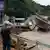 A damaged convenience store building washed away after heavy rains in Gapyeong, South Korea