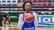 Djelika Tounkara, wearing a blue and white shirt, holds a basketball with both hands Djelika Tounkara, wearing a blue and white shirt, holds a basketball with both hands