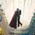 Film still from 'Superman': Superman and Lois Lane embrace and kiss while flying in an impressive hall. 