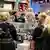 People visit the newly-opened Pop Mart store selling Labubu toys at a shopping mall in Berlin on July 25, 2025