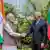India's Prime Minister Narendra Modi (L) shakes hands with the President of Maldives Mohamed Muizzu