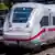 An German Deutsch Bahn ICE fast train train travels along a railway track.