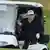 US President Donald Trump steers a golf cart at the Trump Turnberry golf course in Turnberry, Scotland, Saturday, July 26, 2025.