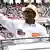 Ivory Coast President Alassane Ouattara gestures as he arrives at the Ebimpe Olympic Stadium for a meeting in June, 2025