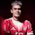 Footballer Luis Diaz poses in a Bayern Munich shirt following his transfer from Liverpool