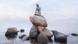 Die kleine Meerjungfrau als Statue im Hafen von Kopenhagen Die kleine Meerjungfrau als Statue im Hafen von Kopenhagen