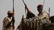 Sudanese soldiers from the Rapid Support Forces unit hold weapons as they secure an area Sudanese soldiers from the Rapid Support Forces unit hold weapons as they secure an area