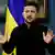 Президент Украины Владимир Зеленский на фоне флага