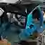 A blue Volkswagen being built at a factory in Dresden on May 15, 2025