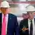 Donald Trump y Jerome Powell durante una visita a las oficinas en renovación de la Reserva Federal.