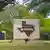 Signage is displayed near the entrance to Federal Prison Camp Bryan on August 01, 2025 in Bryan, Texas